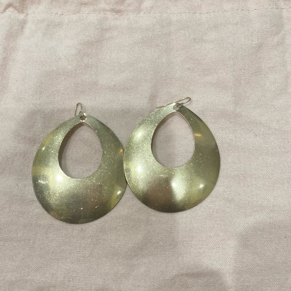 Large attractive, large vintage gold tone hoops.